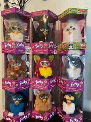 9 International Furbies 6 -Spanish, I Italian, 1 Japanese Tomy and 1 not sure