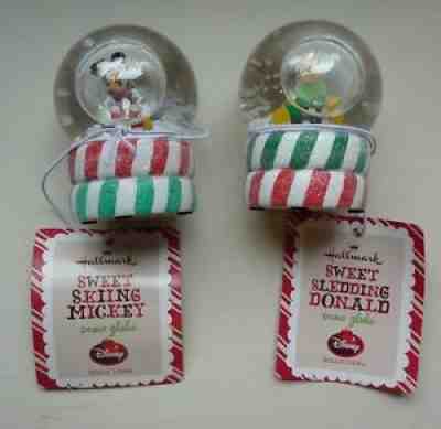 Hallmark Disney lot of 2 snow globes: Sweet Skiing Mickey, Sledding Donald