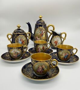 Antique Royal Vienna Porcelain coffee service in cobalt blue.