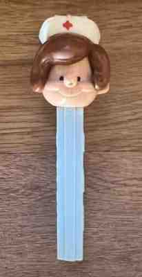 Vintage Nurse Pez Dispenser No Feet Austria Brown Hair With Hat Blue Stem