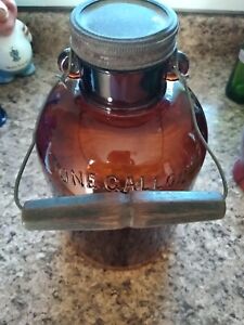 VINTAGE ANCHOR HOCKING AMBER ONE GALLON GLASS JAR WITH LID & METAL/WOODEN HANDLE