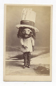 1860’s CDV PHOTO MAN WITH ICE SKATES & HUGE TRAIN TICKET, WEARS HUGE HAT & MASK