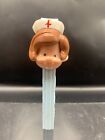 New ListingVINTAGE PEZ DISPENSER NO FEET AUSTRIA BRUNETTE NURSE W/ HAT