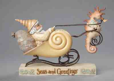 Jim Shore River’s End Coastal Santa Shell Sleigh with Seahorse Figurine 4058852