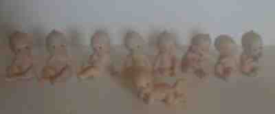 Leftons cupid cupie doll porcelain figurines set 9 figurines