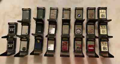 Lot of 23 Zippo lighters assorted lot (Solids, Zippo branded, BMW, Jaguar, ships