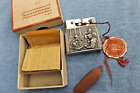 VTG  ZUNDER/1000 MYLFLAM GERMANY UNFIRED SILVER LIGHTER OLD MEN SHOOTING CRAPS