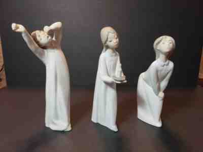 3 Vintage Lladro Figures Boy Yawning Girl with Candle Hands on Knee