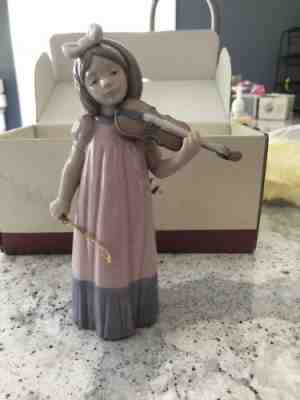 Rare And Collectible Lladro : Girl With Violin NAO Value Guide