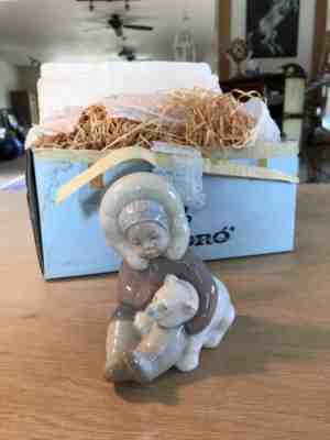 Lladro #5675 Eskimo Boy With Pet Polar Bear with original box and packing