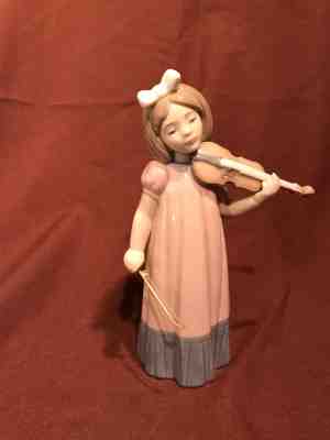 Rare And Collectible Lladro : Girl With Violin NAO Value Guide