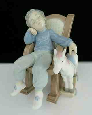 lladro boy rocking chair