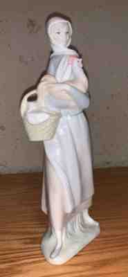 lladro woman with chicken