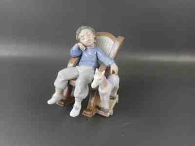 lladro boy rocking chair