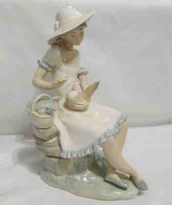 lladro woman with chicken