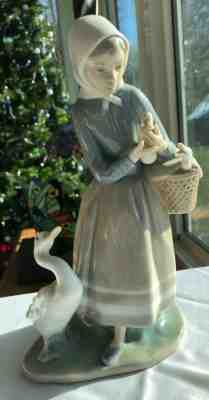 Lladro Girl holding Basket of Goslings with Goose