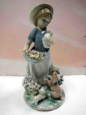 A ROMP IN THE GARDEN - GIRL WITH FLOWERS AND PUPPY DOGS FIGURINE BY LLADRO #6907