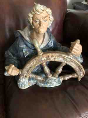 seaman figurine/sea captain at wheel