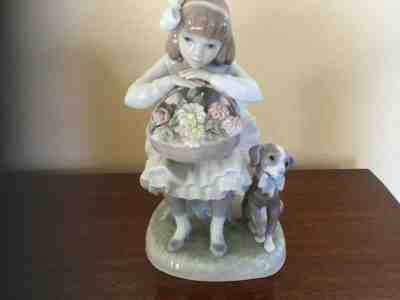 lladro dog with flowers