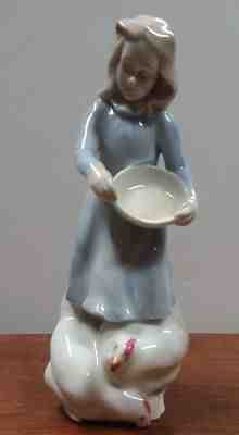 lladro woman with chicken