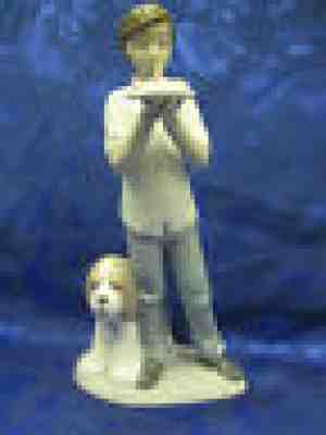 Lladro Nao Daisa #1101 - Homeward Bound - Boy Walking With Puppy In Bag