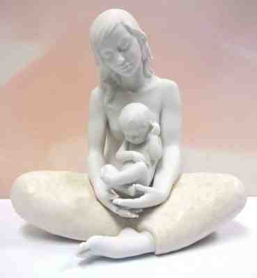 lladro mother holding baby