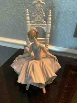 lladro sitting ballerina