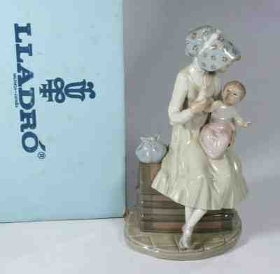 lladro mother holding baby