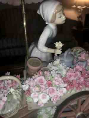 lladro figurine girl with flowers