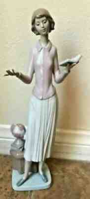 LLADRO #6659 TODAY'S LESSON TEACHER WITH BOOK AND GLOBE BY JOSE JAVIER MALAVIA