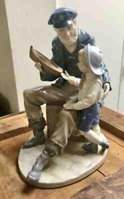 Lladro No. 5207 â??A Tall Yarnâ?~Sea Captain w/ Boy & Boat Figurine Salvador Furio