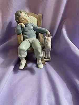 lladro boy rocking chair