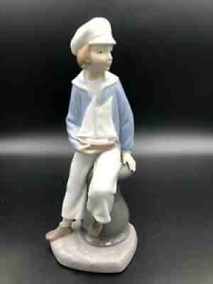 Lladro #4810 on sale boy with a boat