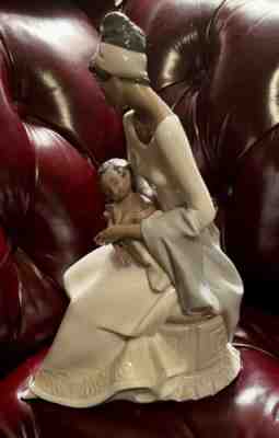 lladro mother holding baby