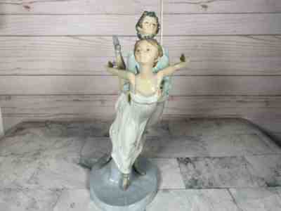 Boy and girl ball lladro