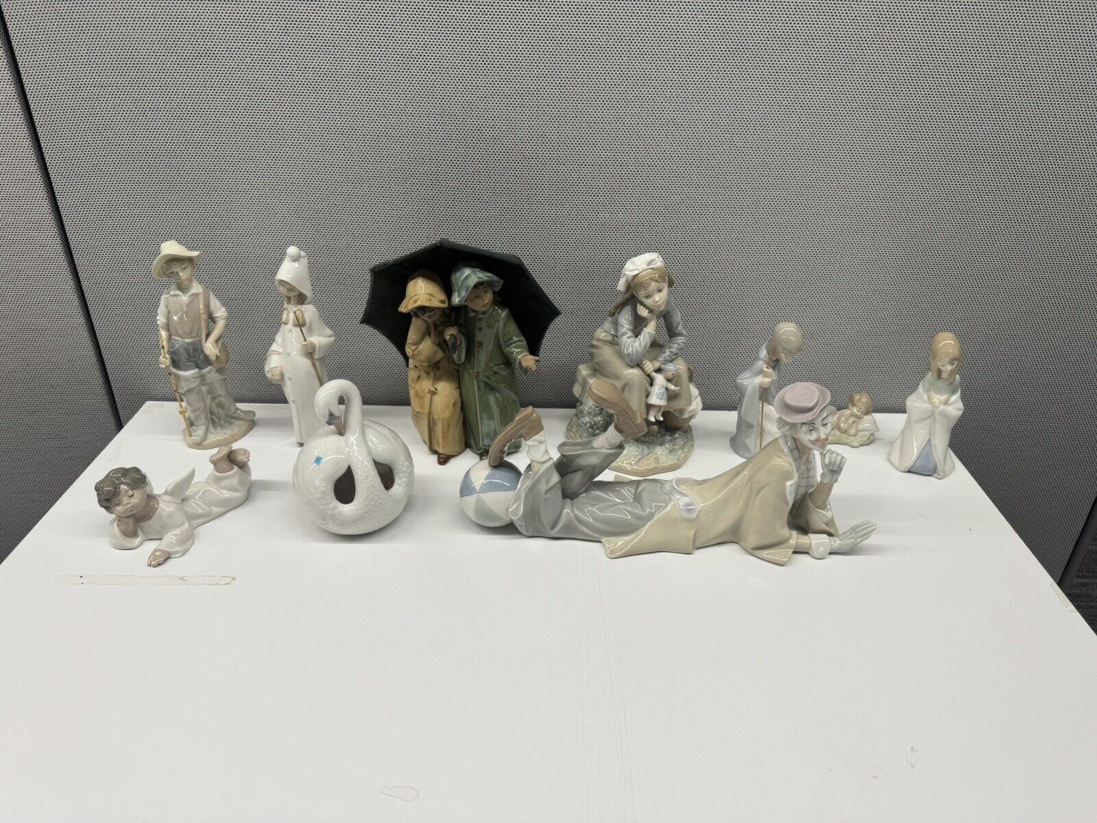 lots of 12 LLadro figures with boxes