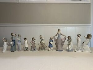 Lladró Figurine Collection Set Of 12!! Amazing Condition