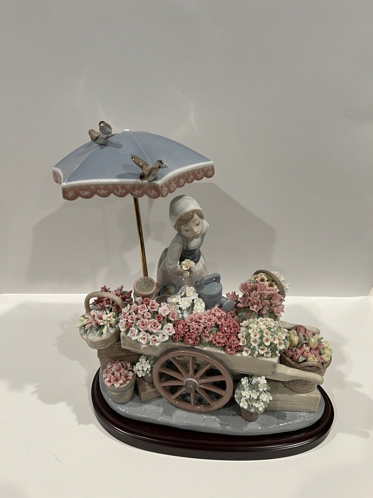 LLADRO #1454 FLOWERS OF THE SEASON - GIRL WITH FLOWER CART, UMBRELLA AND BIRDS