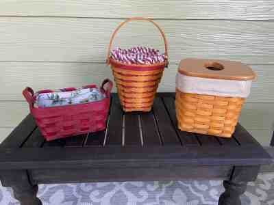 14 Longaberger baskets in one lot - most with protectors and liners