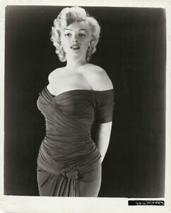 MARILYN MONROE WEARS FAMOUS PUBLICITY GOWN (1952) Studio promotional photo