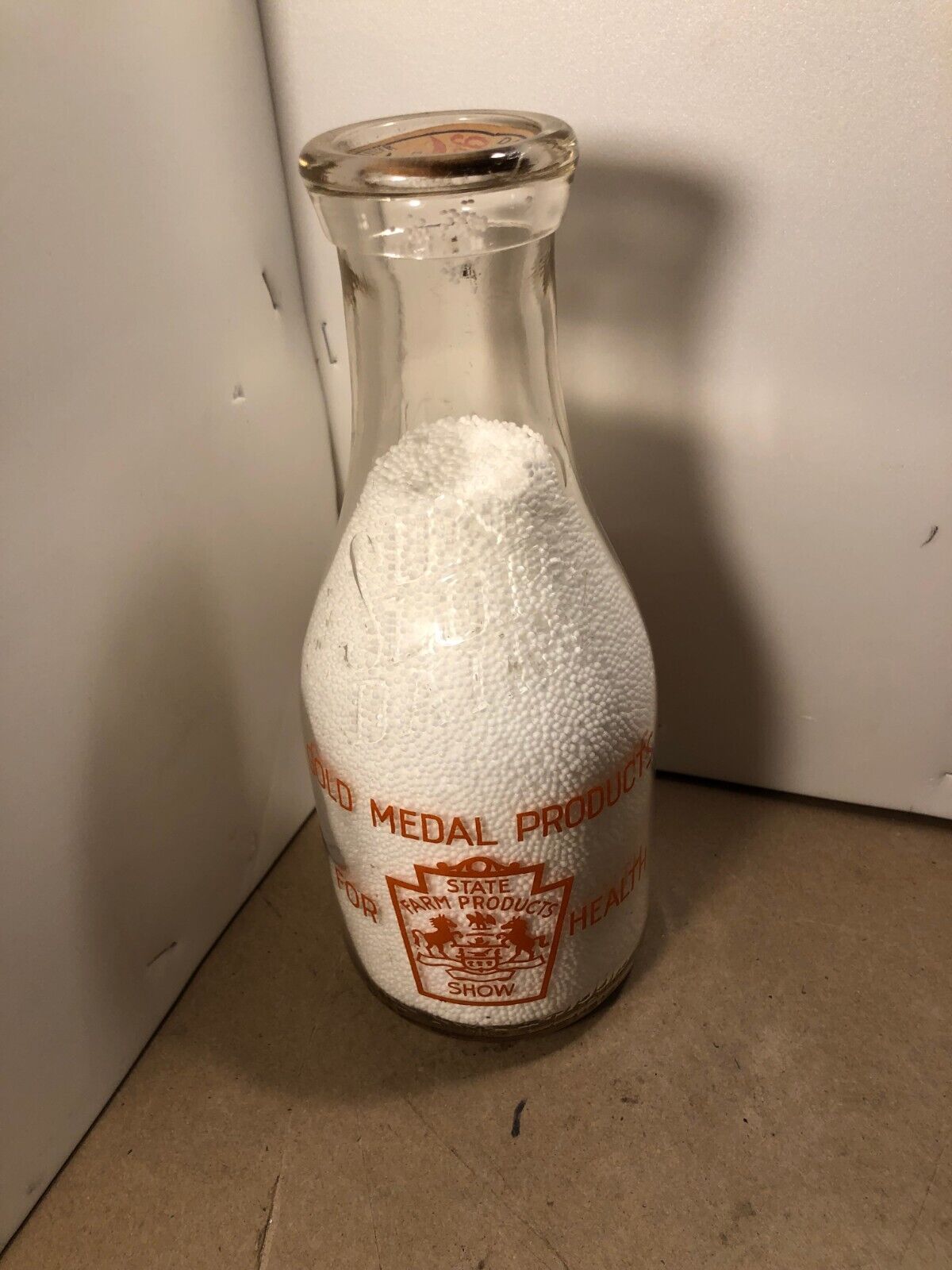Sunny Slope Dairy quart milk bottle,State farm Show gold, Spring City, PA