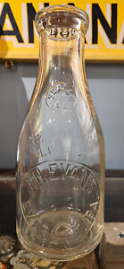 J.H. EVANS EVERETT PA BEDFORD COUNTY DAIRY EMBOSSED BUTTERMILK CAP MILK BOTTLE