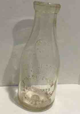 Vintage embossed Maine milk bottle Hans Peterson Falmouth Maine 