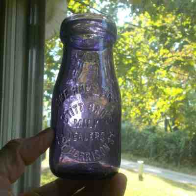 STITT BROS MILK DEALERS 1027 HARRISON ST RARE EARLY 1/2 PT AMETHYST MILK BOTTLE