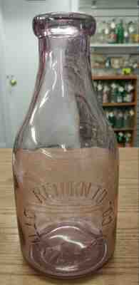 VINTAGE OTTAWA DAIRY CO. RARE PURPLE GLASS QUART MILK BOTTLE