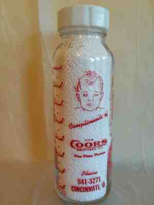 COOR'S DAIRY, CINCINNATI, OH. Round, half pint, pyro. Vintage Baby Bottle. 