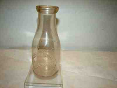 Veterans Home Commission Rocky Hill Ct on pint embossed milk bottle