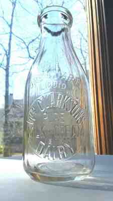 WM. CLARKSON'S PURE MILK AND CREAM 1919 DAIRY EMBOSSED SLUG PLATE MILK BOTTLE