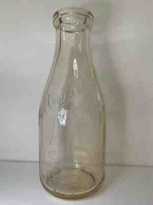 Valley Bell Dairy Co. Inc Clear quart Milk Bottle. Marked with a Bell.