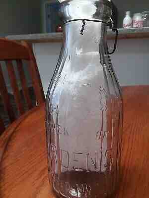 VINTAGE GAIL BORDEN CONDENSED 1 QT. MILK RIBBED BOTTLE WITH METAL LID